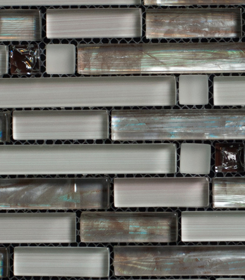 Glass mosaic tile pattern with metallic and reflective textures