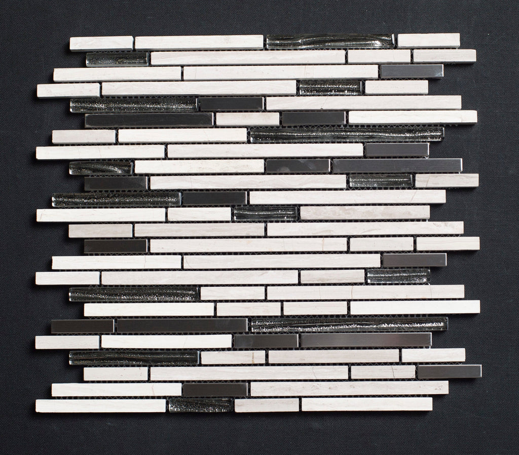 Mosaic tile pattern with black and white tiles on a dark background