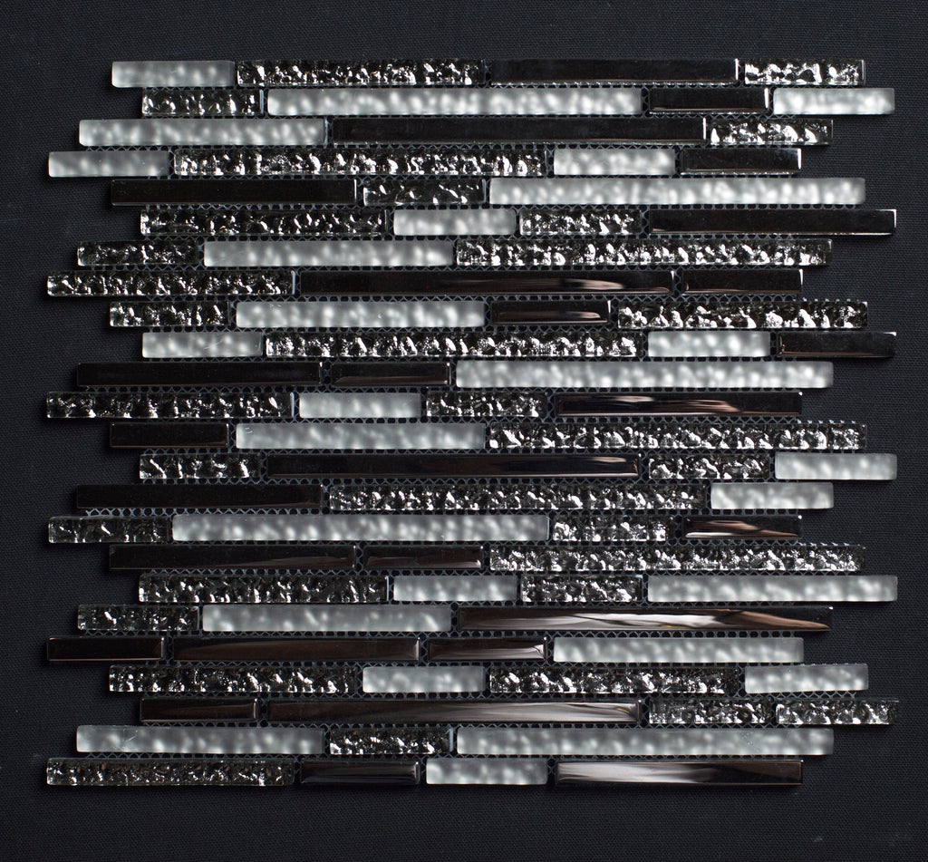 Glass mosaic tile pattern on a black background