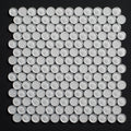 White circular tiles arranged in a grid pattern on a black background