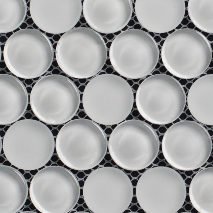 Pattern of white circular bowls on a black geometric background