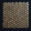 Square tile with circular glass pieces on a black background