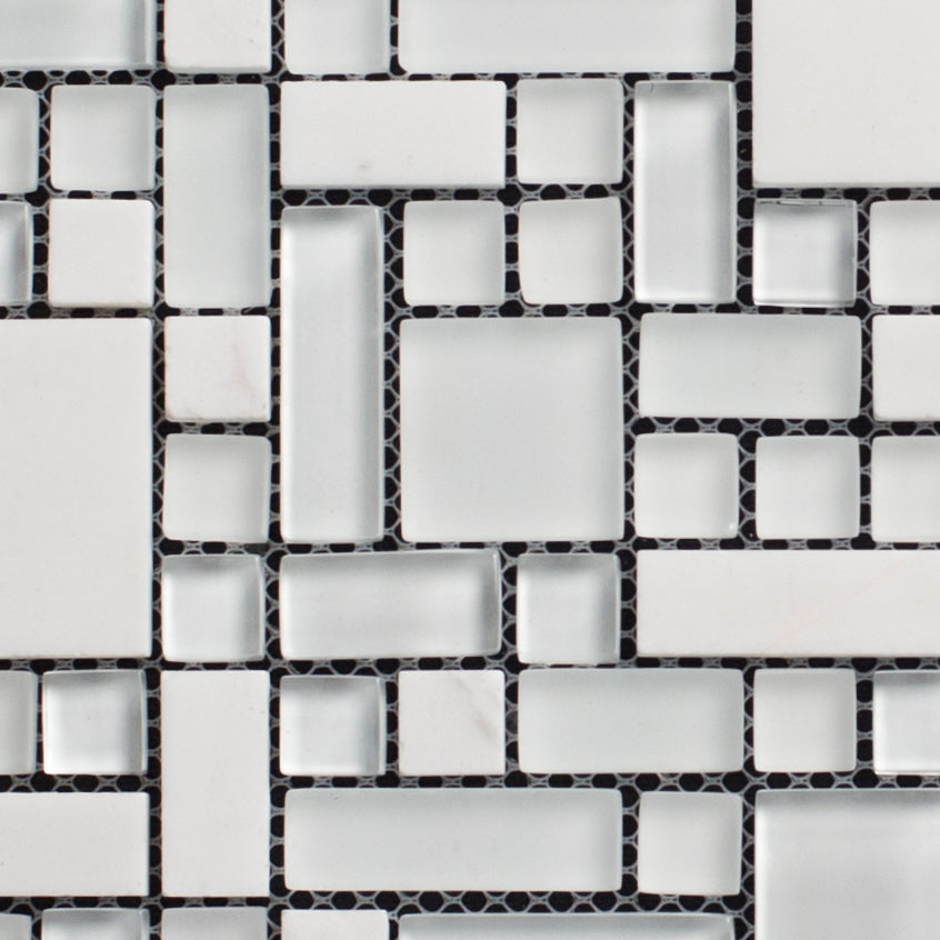 Mosaic pattern of black and white tiles on a white background