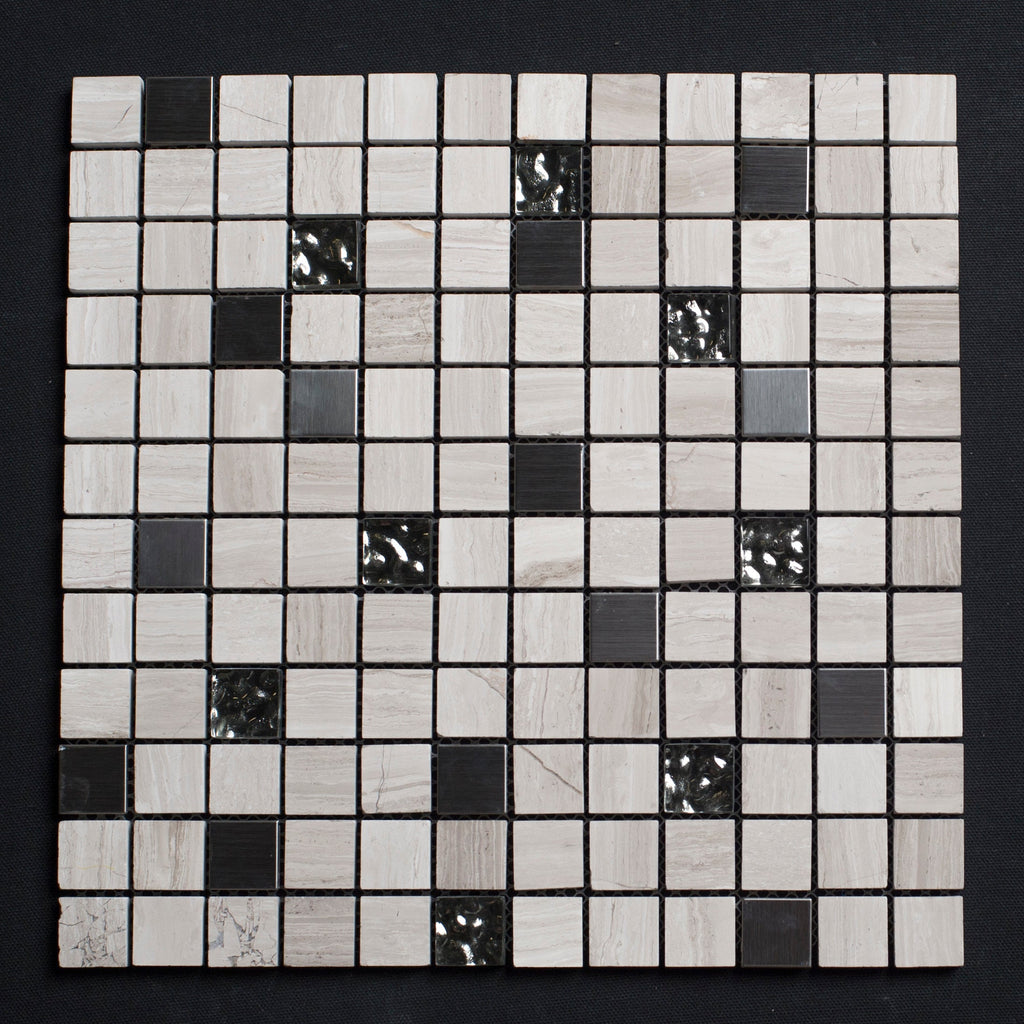 Mosaic tile sample with black and white squares on a dark background