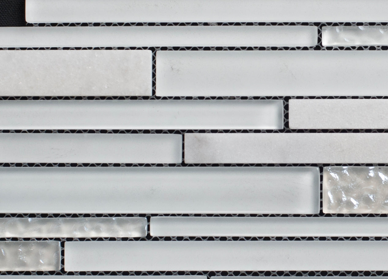 Close-up of a mosaic tile pattern with white and gray tiles.