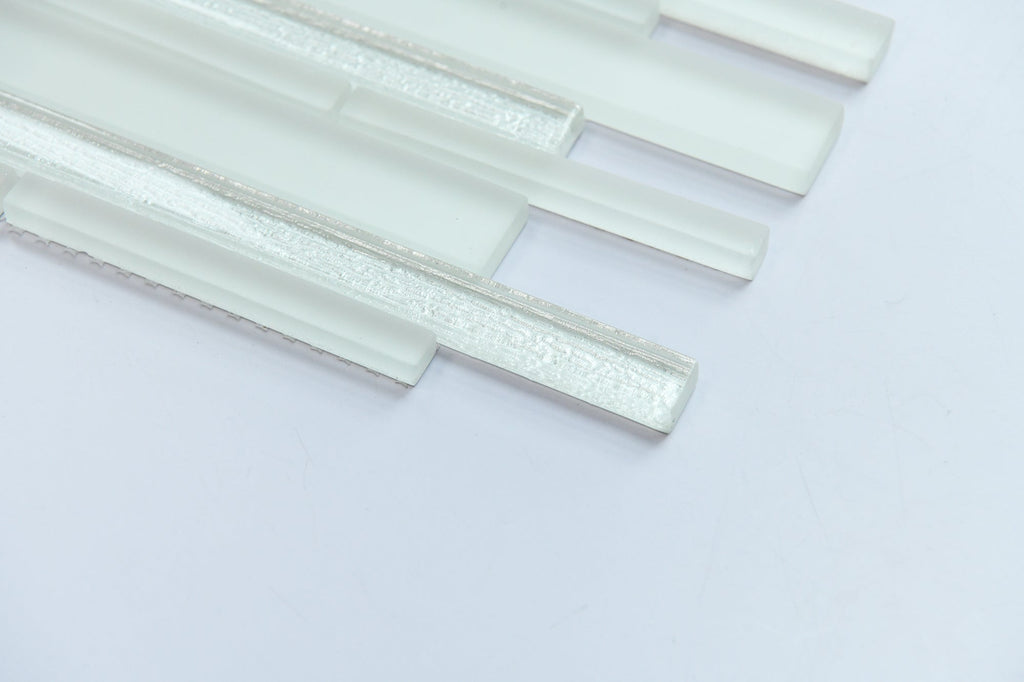 White glass mosaic tiles on a light gray background
