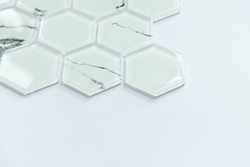 Hexagonal mirror tiles on a white background