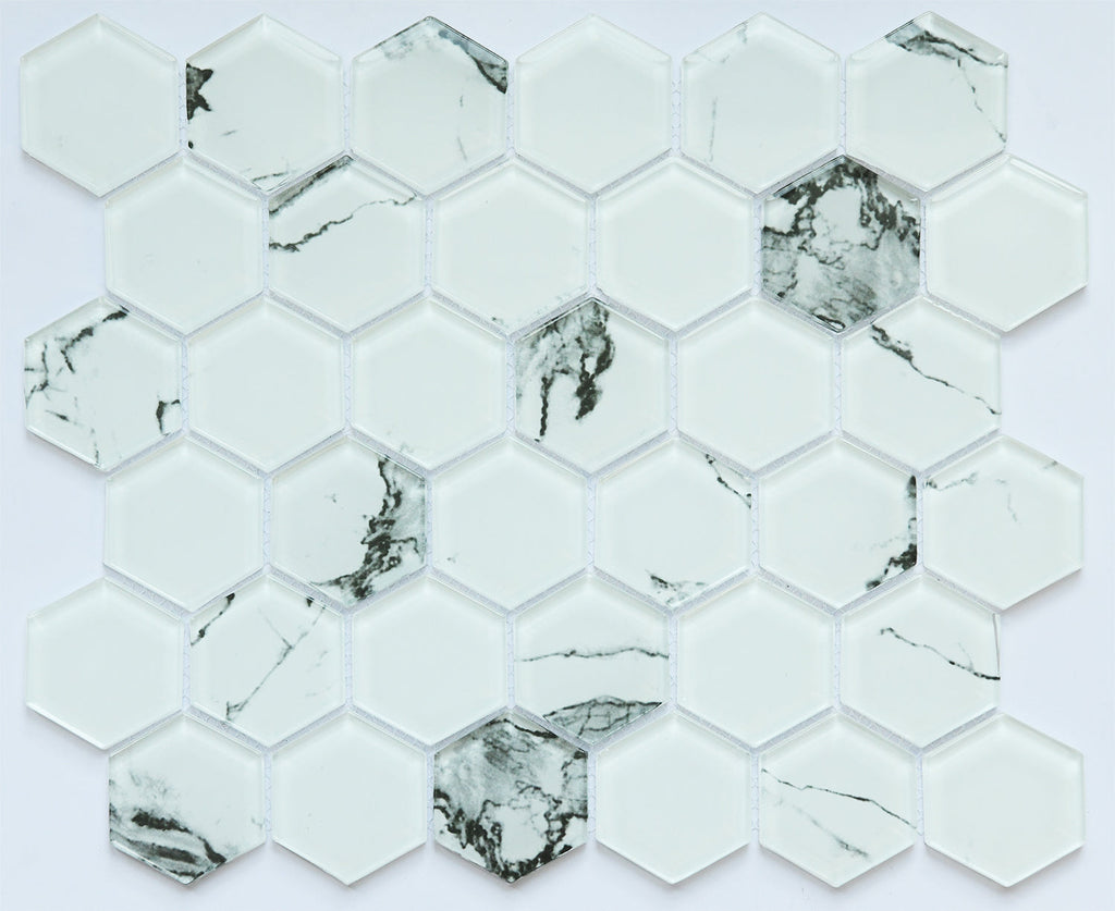 Hexagonal marble mosaic tiles with a white and gray pattern on a light gray background