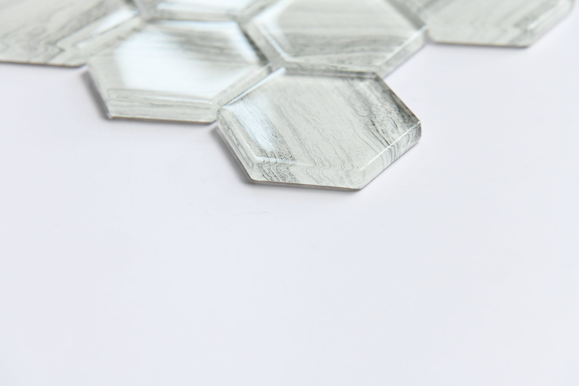 Hexagonal glass tiles on a white background