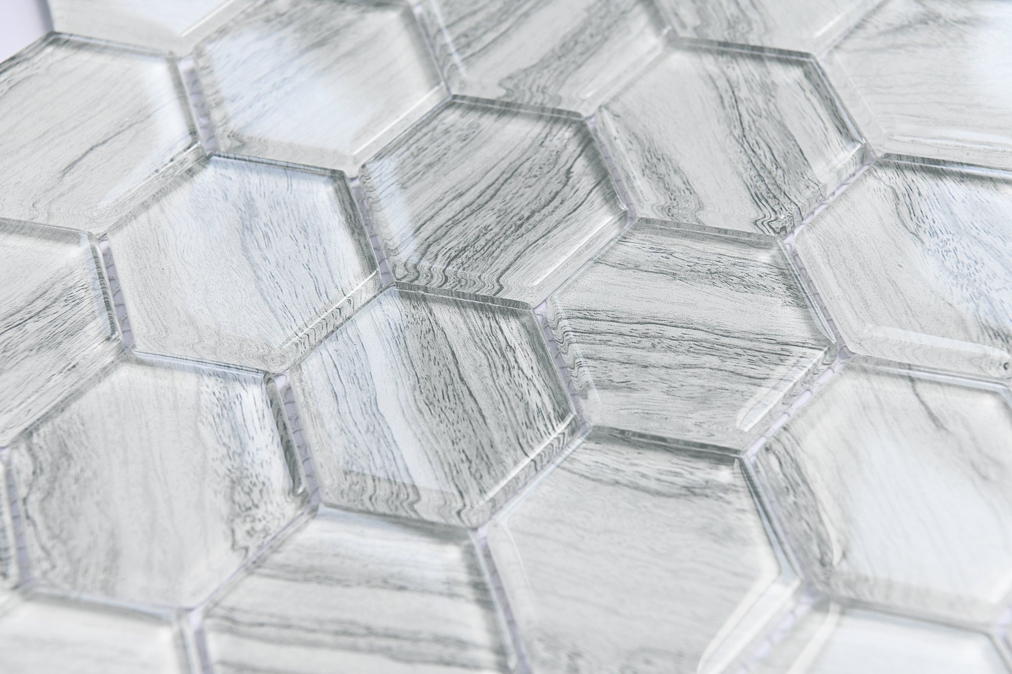 Close-up of hexagonal tile pattern with a metallic sheen