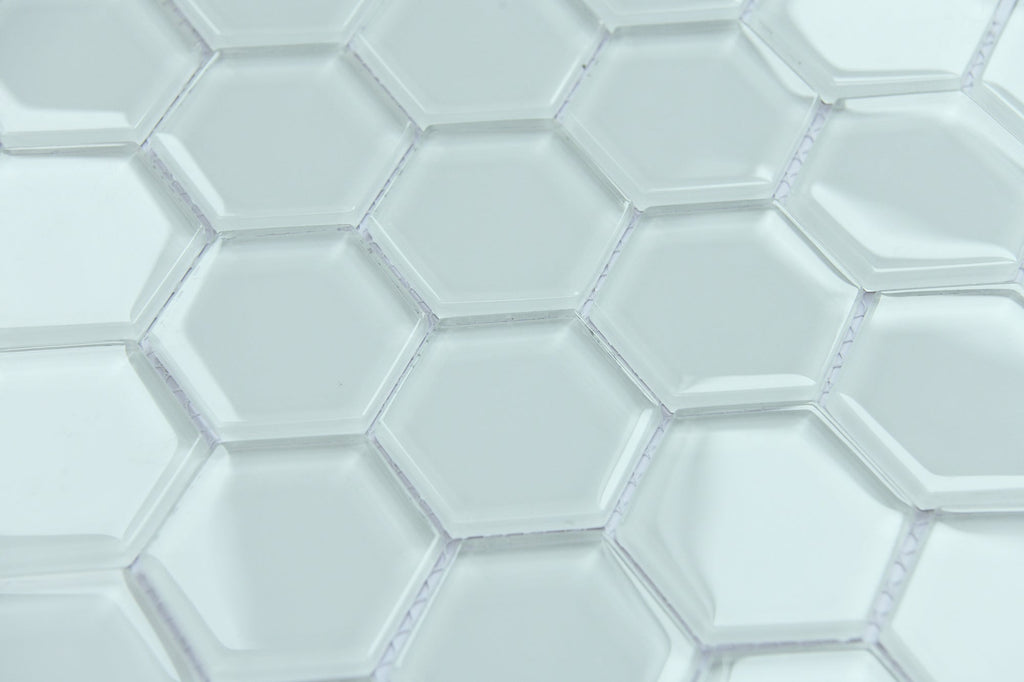 Close-up of hexagonal white tiles with a subtle pattern