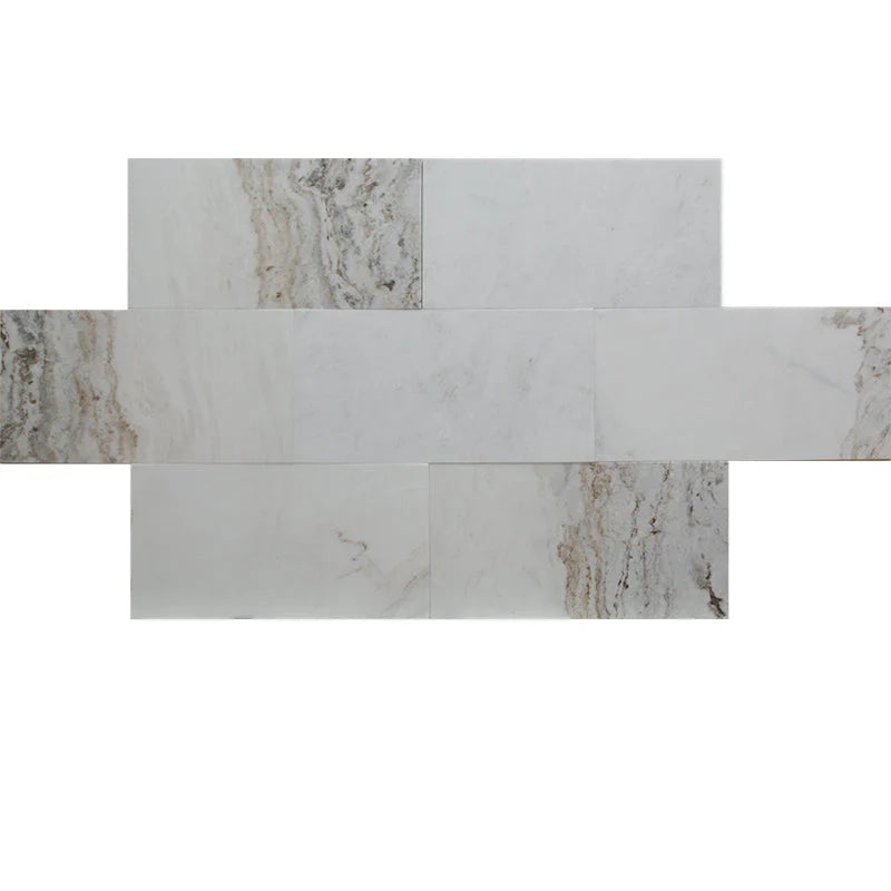 Calacatta Amber marble honed tile 12x24 display showing warm amber veining on soft white base.