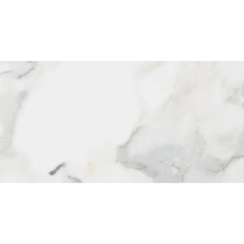 Calacatta Gold marble tile 12x24 showcasing a bright white base with unique gold veining patterns.