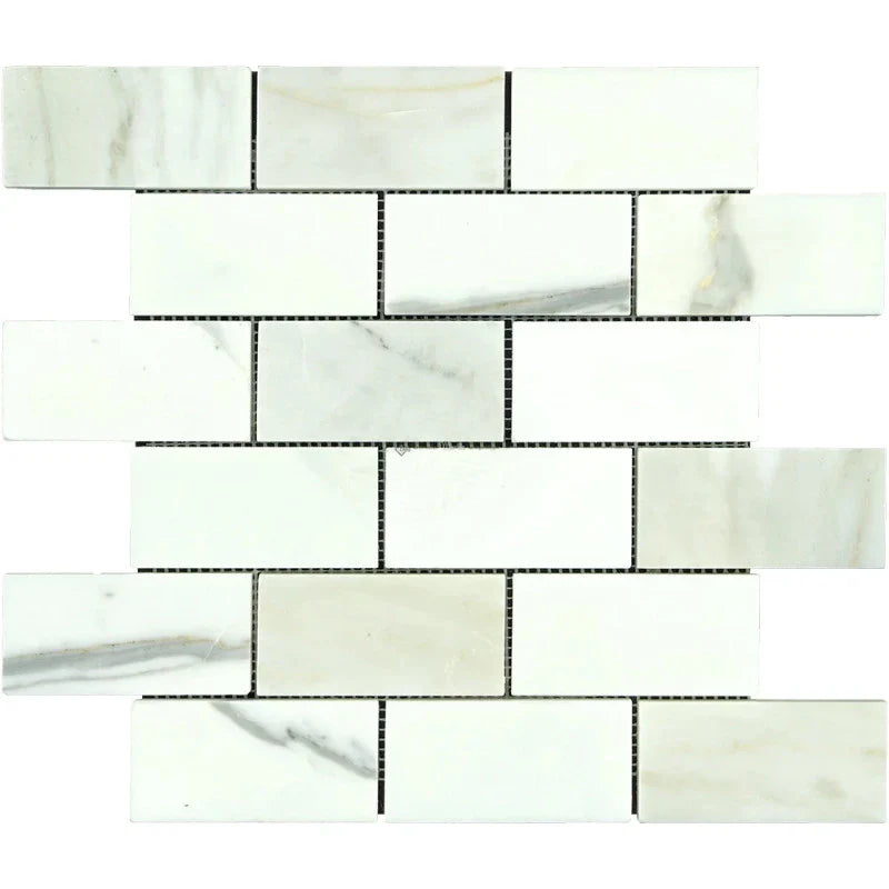 Calacatta Gold Marble 2x4 Honed Mosaic Tile.