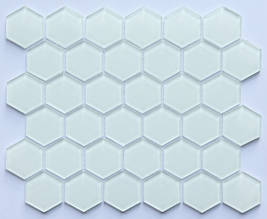 Hexagonal glass mosaic tiles on a light purple background